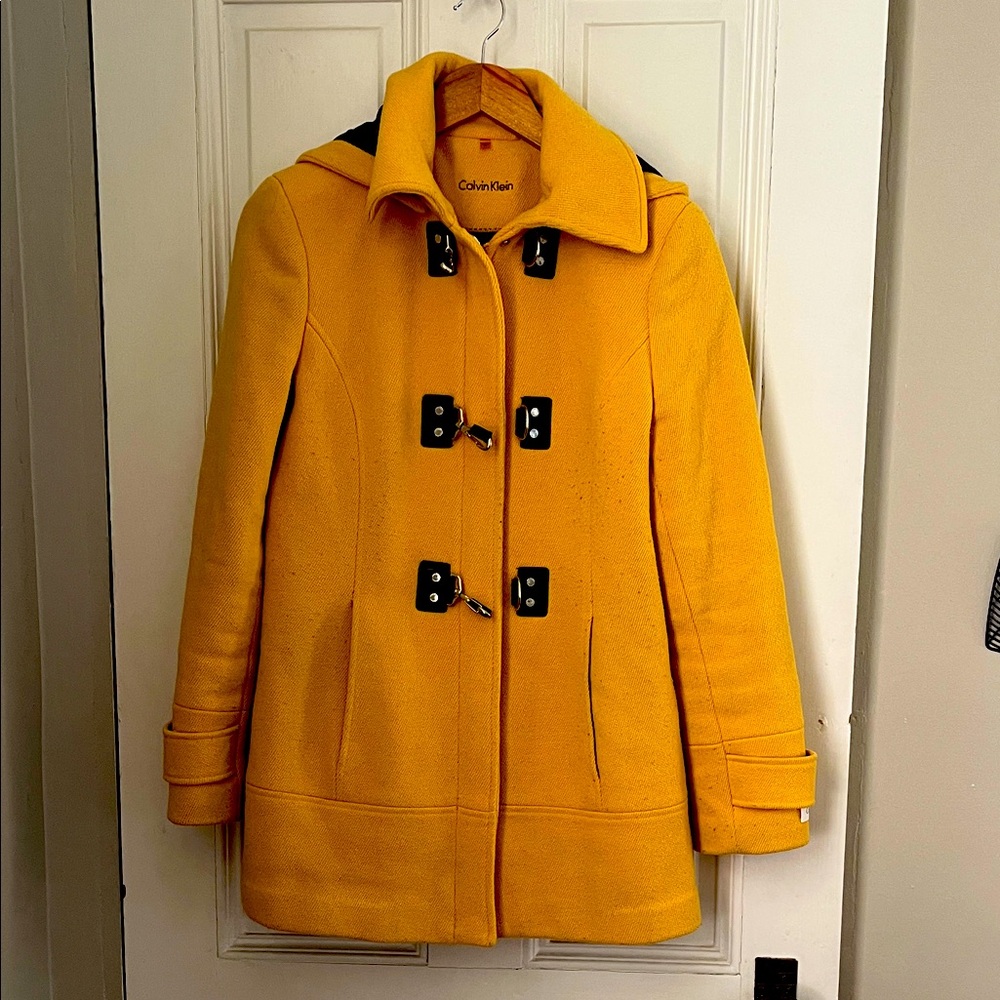 Calvin Klein Women's yellow coat.